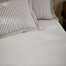 Hebden mauve fitted sheet on bed image 1