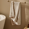 Hebden Towel Olive on wall image