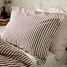 Hebden pillowcases on bed image 1