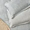 Hebden navy pillowcase pair on bed image 1
