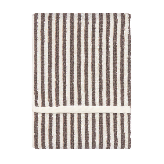 image cut out on white background of folded stripe chocolate brown towel