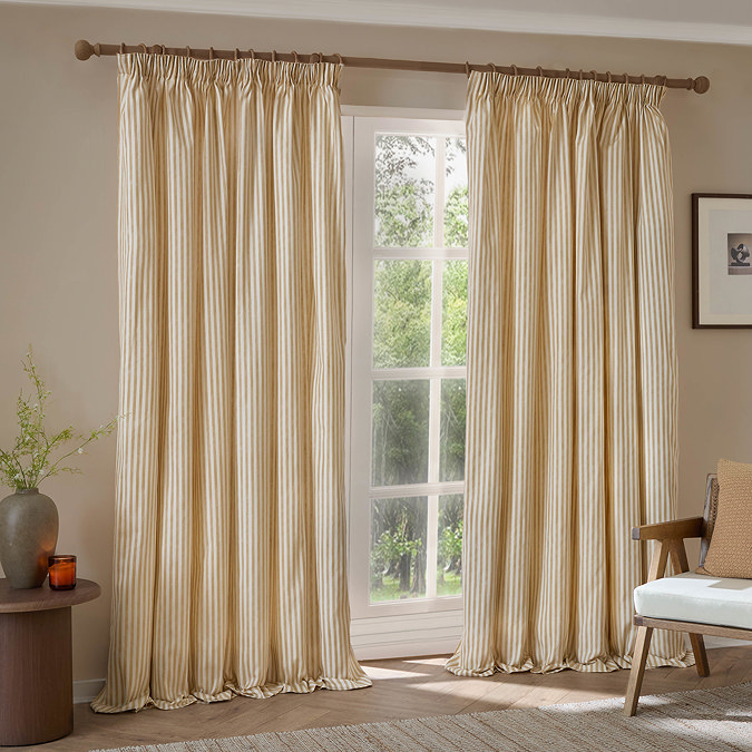 Hebden Striped Black Out Pencil Pleat Curtains in Honey Yellow on a window image