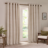 natural coloured stripe curtains open across a large living room window