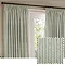 image of green striped pencil pleat curtains over a window, with smaller close up image of pattern and colour swatch in the right corner