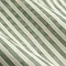 close up on green striped pattern of curtains