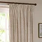 close up on natural coloured striped curtains, highlighting the pencil pleat style