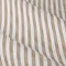 close up on pattern and fabric of natural striped curtain