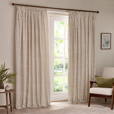 close up on natural coloured striped curtains, highlighting the pencil pleat style