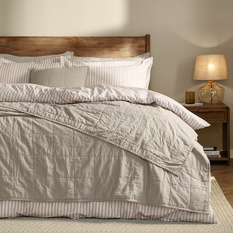 washed cotton bedspread in stone on bed image
