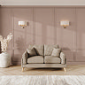lifestyle image of small sofa with light oak feet in latte fabric