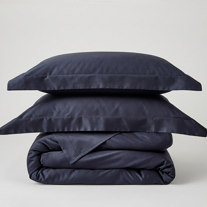 stack of navy bedding