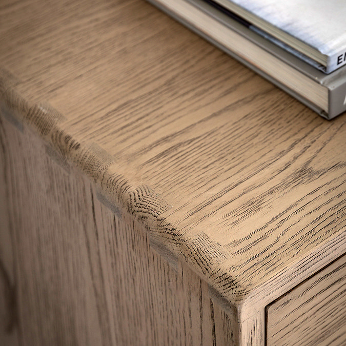 close up image of smoked oak surface of wooden sideboard with gentle edge