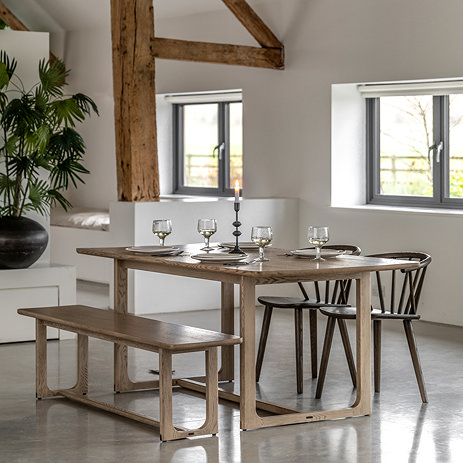 Howick Wooden Dining Table in smoked oak in living room image 1