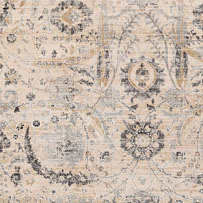 close up swatch image of beige rug with grey and mustard floral patterns