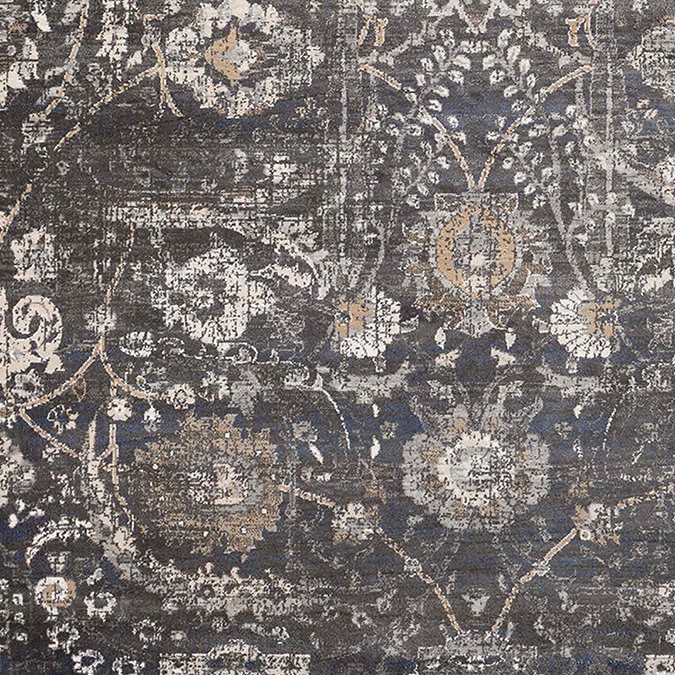 close up swatch image of black rug with beige and grey floral pattern