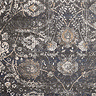 close up swatch image of black rug with beige and grey floral pattern