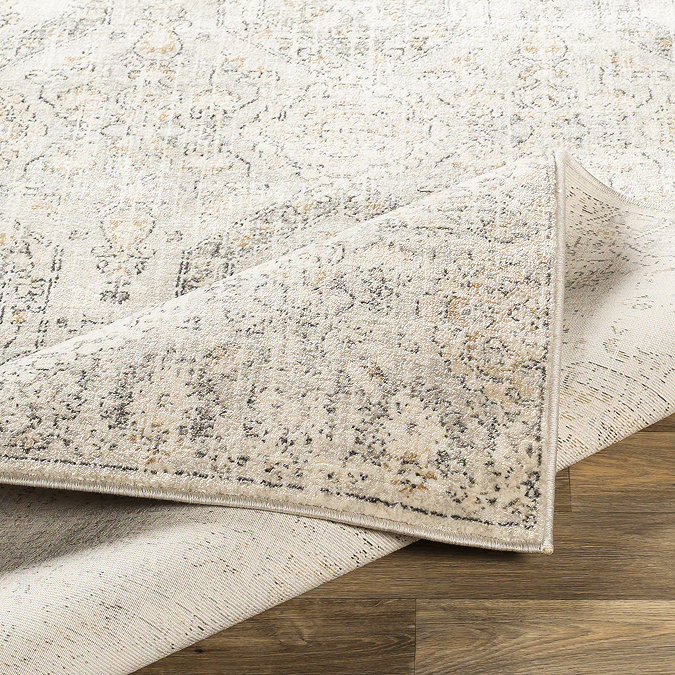 image of cream rug with grey and beige vintage patterning