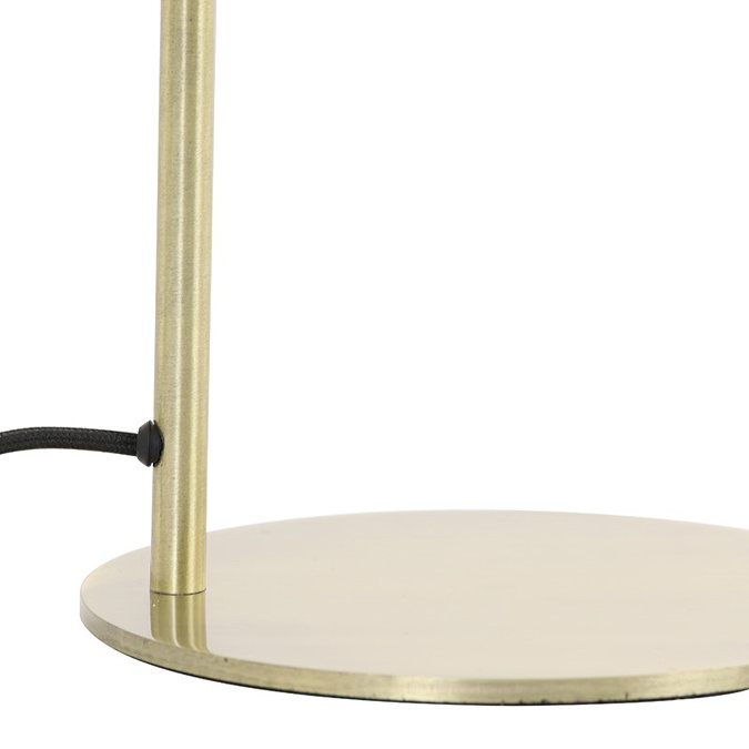 image cut out on white background of antique bronze lamp body with circular base and black cable extending out of the back