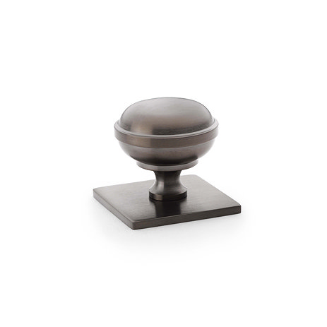 Isen Collection dark bronze pvd cabinet knob on square plate image