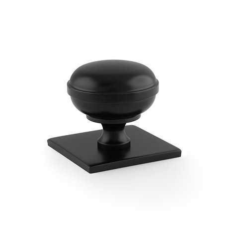 Isen Collection matt black cupboard knob on square plate