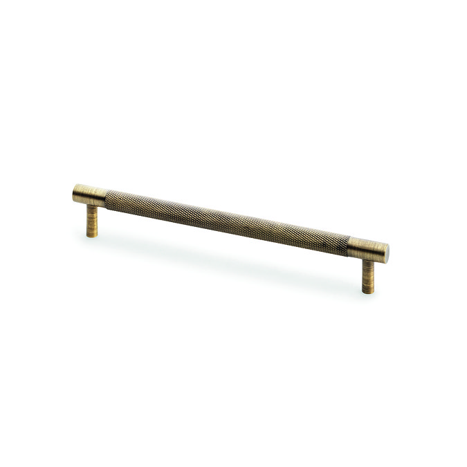 image cut out on white background of antique brass cabinet handle