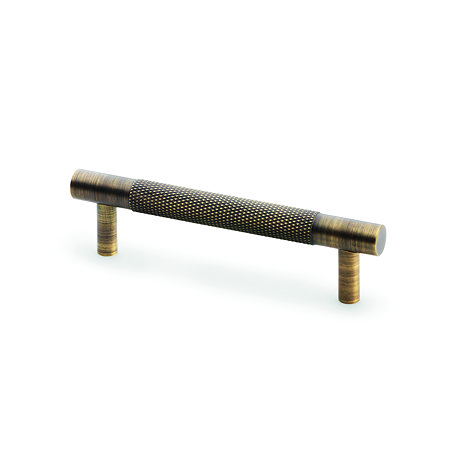 cut out image of antique brass knurled cabinet bar handle