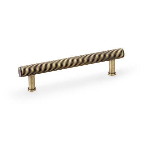 cut out of 128mm antique brass reeded cabinet pull handle