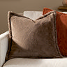 Kallu Mocha Cushion Front View on Cream Chair