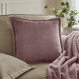 Mulberry kallu cushion on a sofa image 1