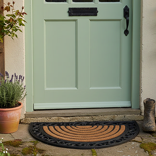Karina Halfmoon Scraper Mat in Front of Green Door