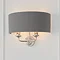 closer image of charcoal shade and 2 nickel coloured arms of wall lamp