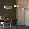 wide shot of the kensington lighting range in antique brass