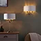 wide shot of kensington table lamp and wall lamp