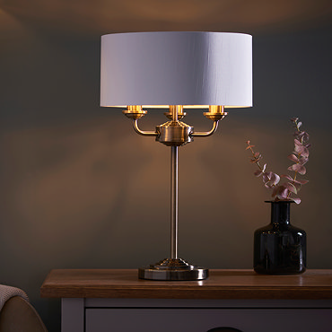 wide shot of kensington table lamp and wall lamp