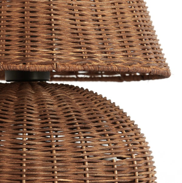 image cut out on white background close up on middle of dark brown rattan lamp
