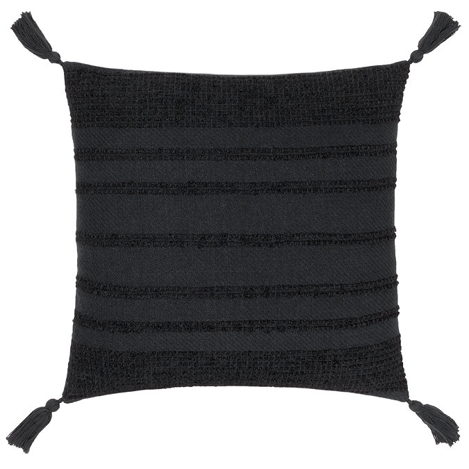 image cut out on white background of black square cushion with textured stripe front and tasselled corners