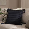 image of square black cushion with subtle textured stripes and tasselled edges