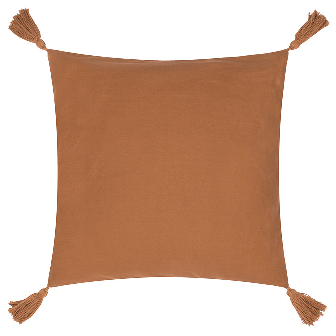 image cut out on white background of dark orange cushion with tasseled edges