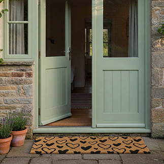 Large Hearts Doormat in Lifestyle Shot Outside Patio Doors