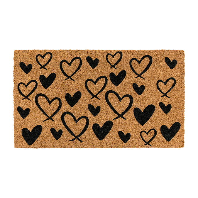 image cut out on white background of rectangular natural doormat with black heart pattern