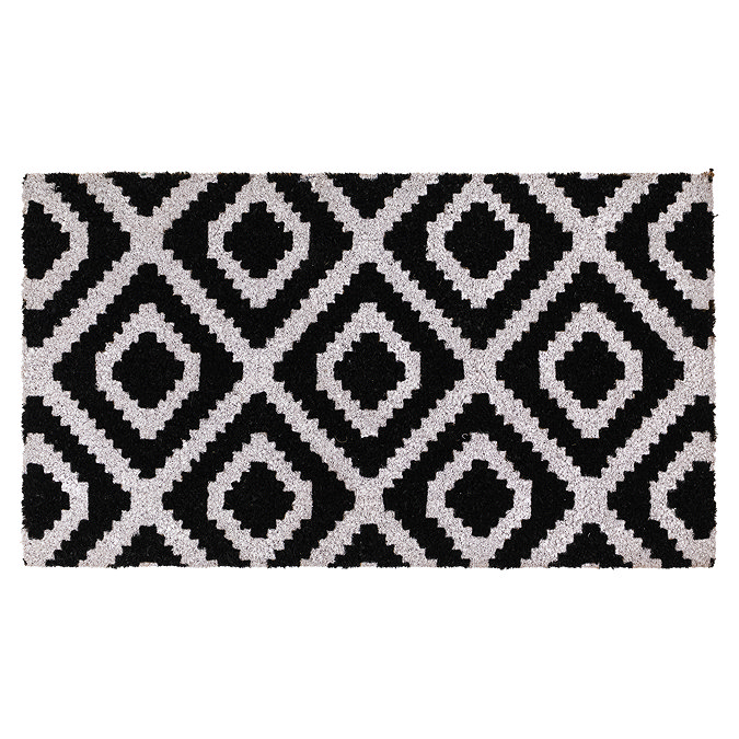 image cut out on white background of rectangular doormat with black and white diamond pattern