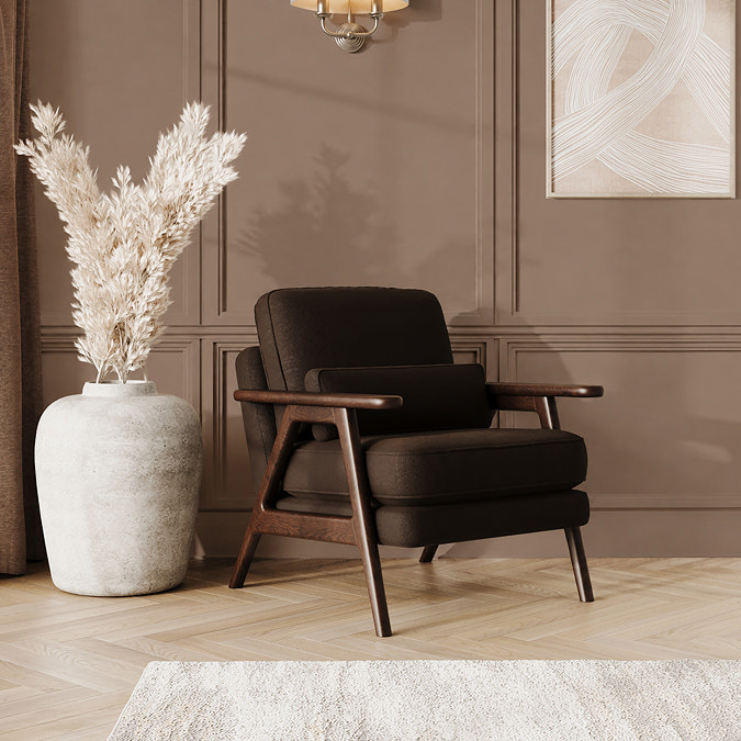 lifestyle image of mid-century brown velvet accent chair with warm wood frame
