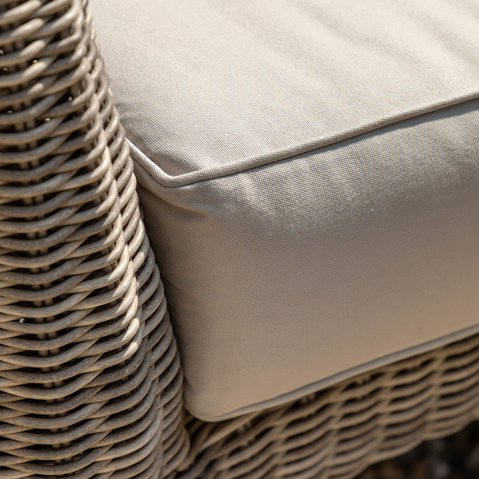 close up on plush cream cushions of outdoor sofa