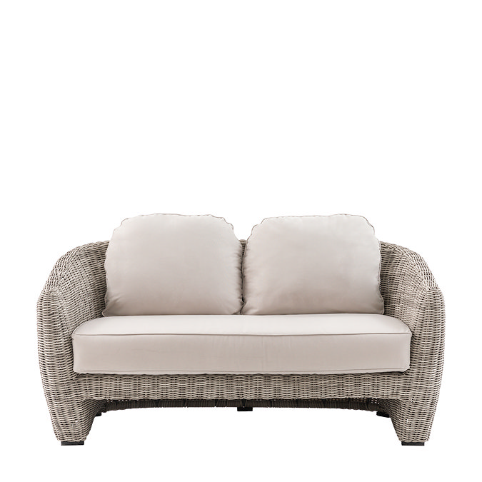 front on image of two seat outdoor sofa with rattan sides and plush cream cushions