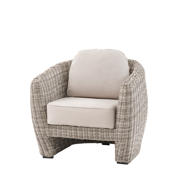image cut out on white background of rattan curved back single armchair