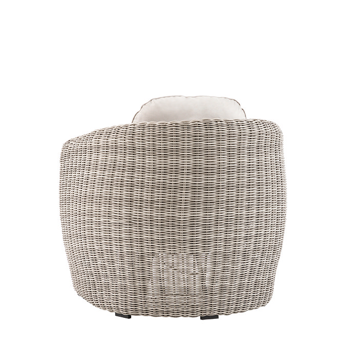 image cut out on white background taken from the back of curved rattan garden armchair