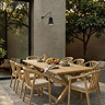 image of rectangular 8 seat acacia wood dining table on garden patio
