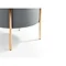 close up on gold legs of velvet grey stool, image cut out on white background