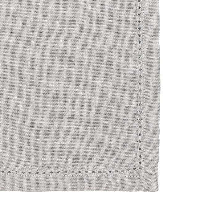 close up image cut out on white background of dove grey linen style napkin with dotted stitched edge