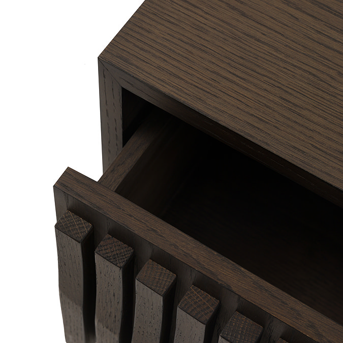 close up image of drawer of wave panelled walnut tv unit slightly open 